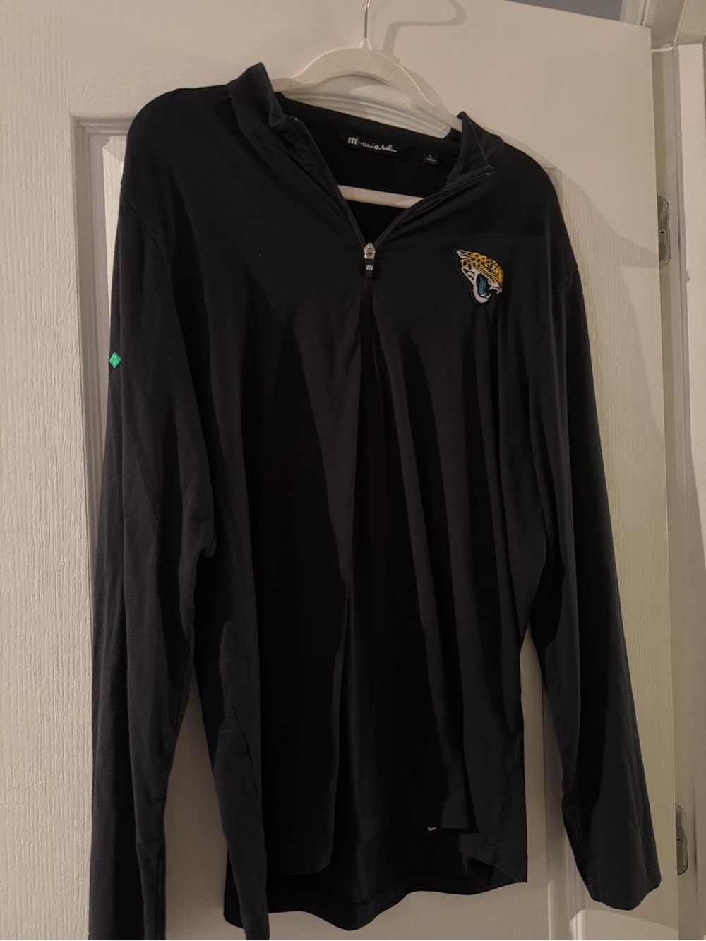Travis Mathew Jacksonville Jaguars Black Quarter-Zip Pullover
